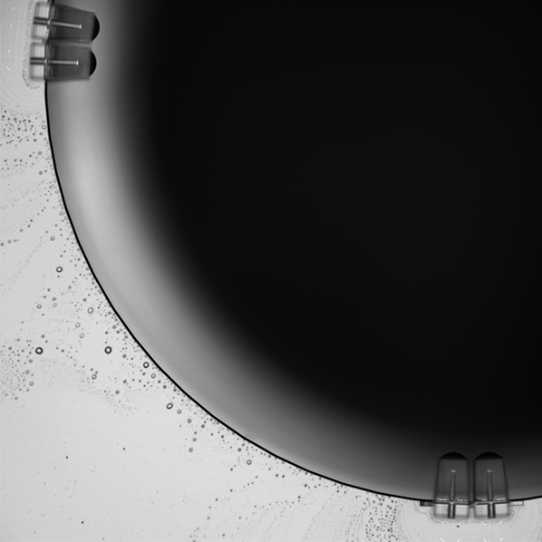 Microlenses printed on PIC side facets to focus light coming from the waveguides