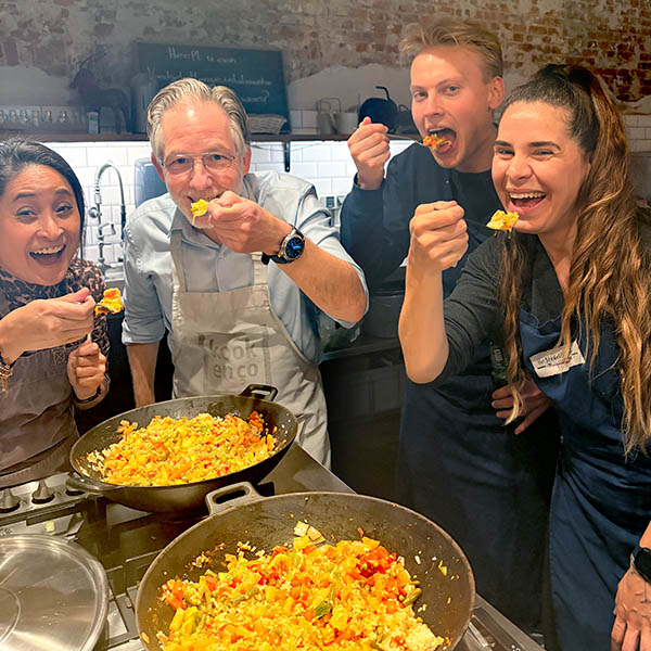 PHIX employees having fun at a cooking workshop
